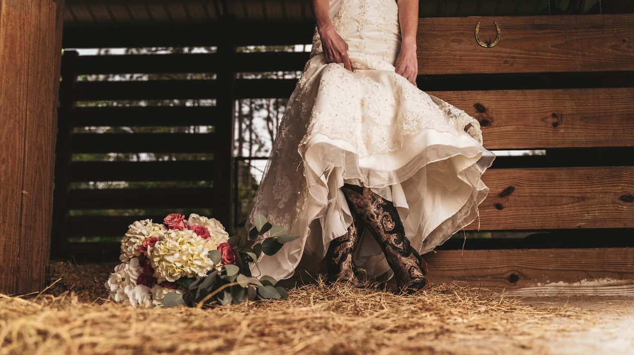 LOW SECTION OF WOMEN WITH BOUQUET