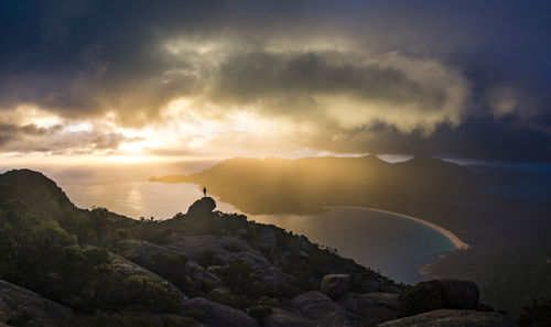 Scenic view of rocks against sky during sunset