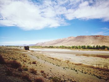 Scenic view of desert against sky