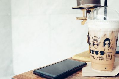 Close-up of coffee served on table