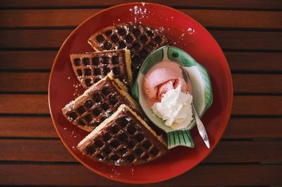 Close-up of ice cream waffles in bowl on table