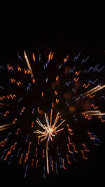 Firework display at night