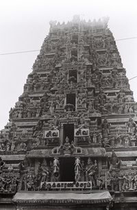 Low angle view of temple against building