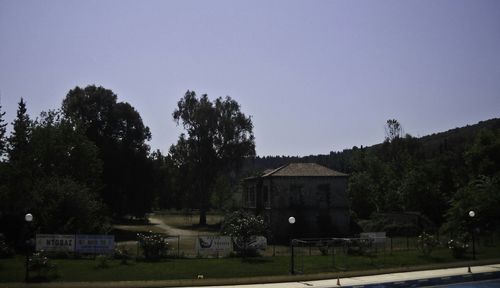 Buildings against clear sky