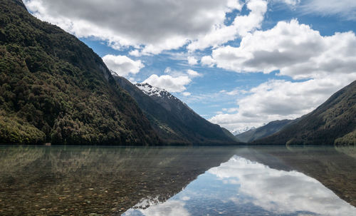 Reflections on a lake during sunny day. lake gunn, fiordland national park, new zealand