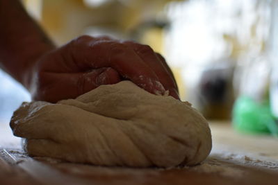 Close-up of person preparing food