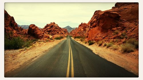 Country road passing through landscape