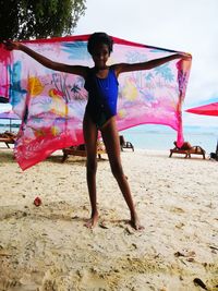 Full length of boy on beach
