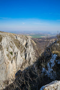 Scenic view of landscape against blue sky