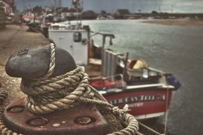 Ship moored at harbor