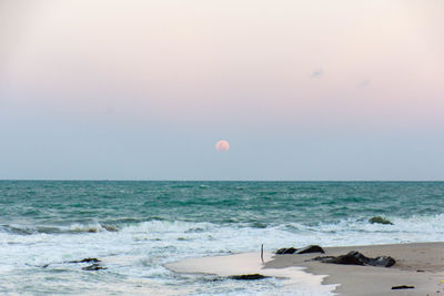 Scenic view of sea against clear sky