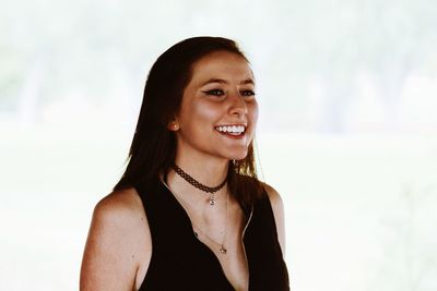 Close-up of smiling young woman