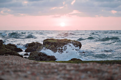 Scenic view of sea against sky during sunset