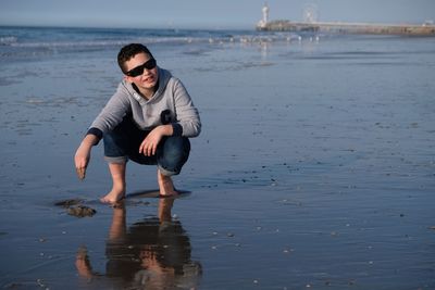 Portrait of young man on beach