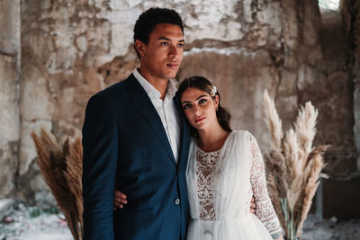 Young couple standing outdoors