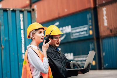 Woman working with mobile phone