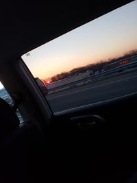 Scenic view of sky seen through car windshield