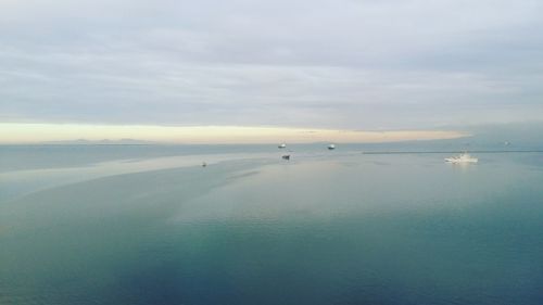 Scenic view of seascape against cloudy sky