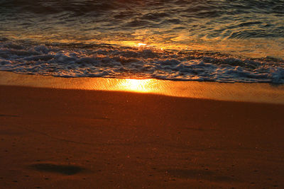 Scenic view of sea at sunset