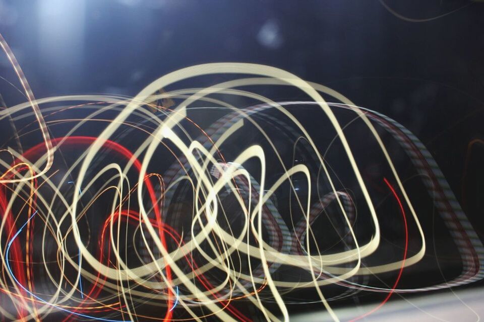 CLOSE-UP OF LIGHT TRAILS ON STAGE