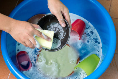 High angle view of woman preparing food in bowl