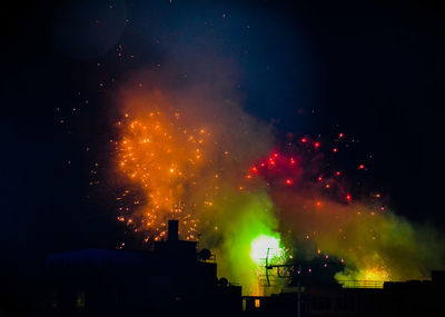 Firework display at night