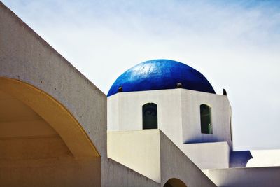 Low angle view of church against blue sky