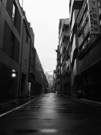 Road leading towards buildings