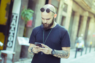 Young man using mobile phone