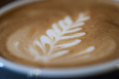 Close-up of cappuccino on table