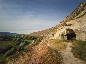 View to the caves of karst limestone hills at orheiul vechi, old orhei complex, near trebujeni