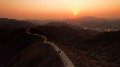 Scenic view of mountains against sky during sunset