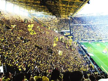 Group of people looking at stadium