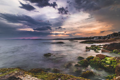 Scenic view of sea against sky during sunset