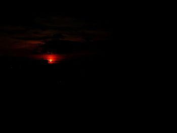 Scenic view of silhouette landscape against sky at sunset