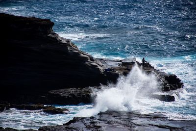 Waves splashing on rocks