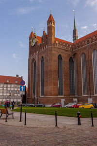 Group of people in front of historical building
