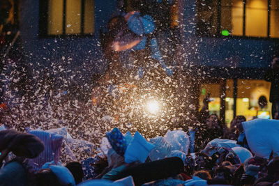 Group of people at music concert at night