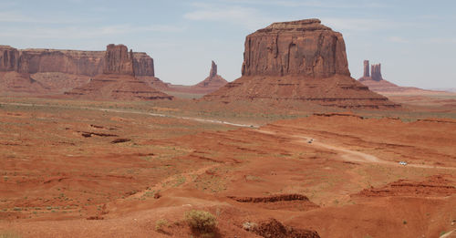 Rock formations in desert against sky