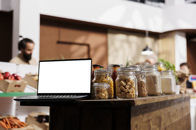 Man using laptop at table