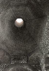 Low angle view of illuminated ceiling