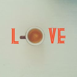 Close-up of coffee cup on table