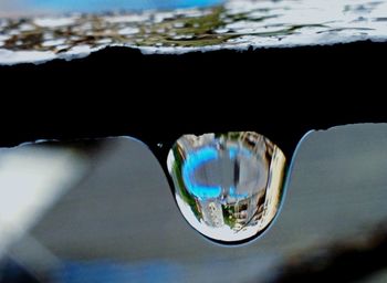 Close-up of water against blue sky