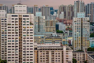 Buildings in city against sky