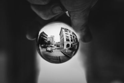 Close-up of person holding glass