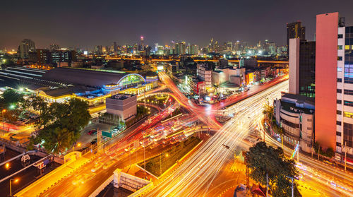 High angle view of illuminated city street at night