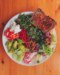 High angle view of chopped vegetables in bowl on table