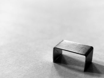 High angle view of camera on table against white background