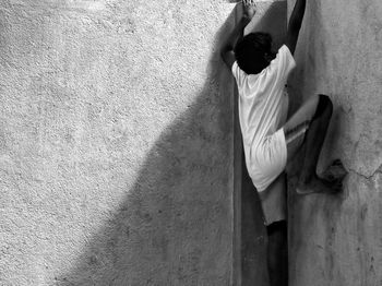 Shadow of man on building