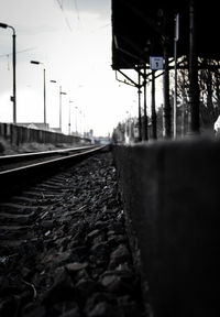 Close-up of railroad track against sky